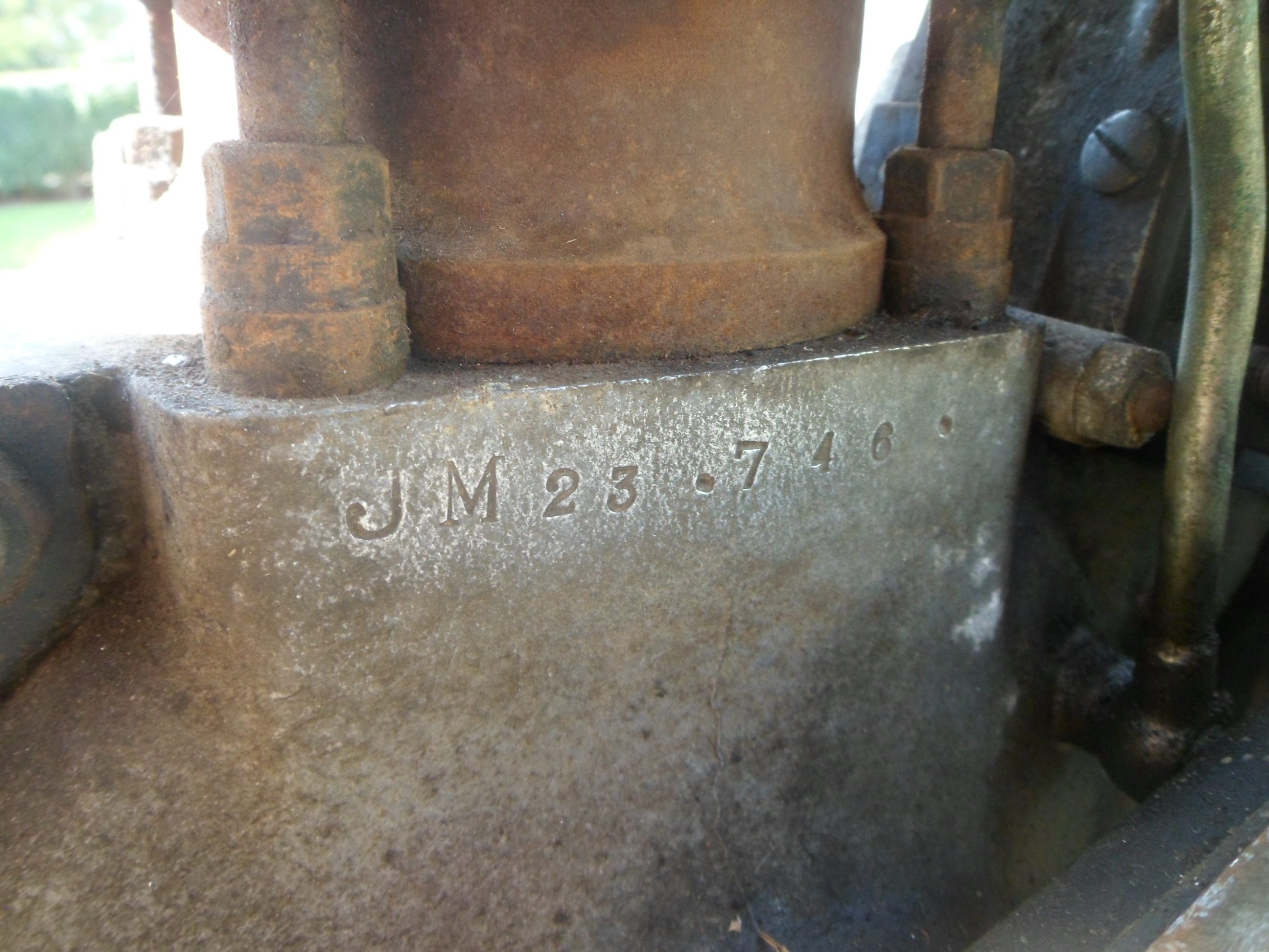 Close-up of the BSA M23 fuel tank and worn paint.