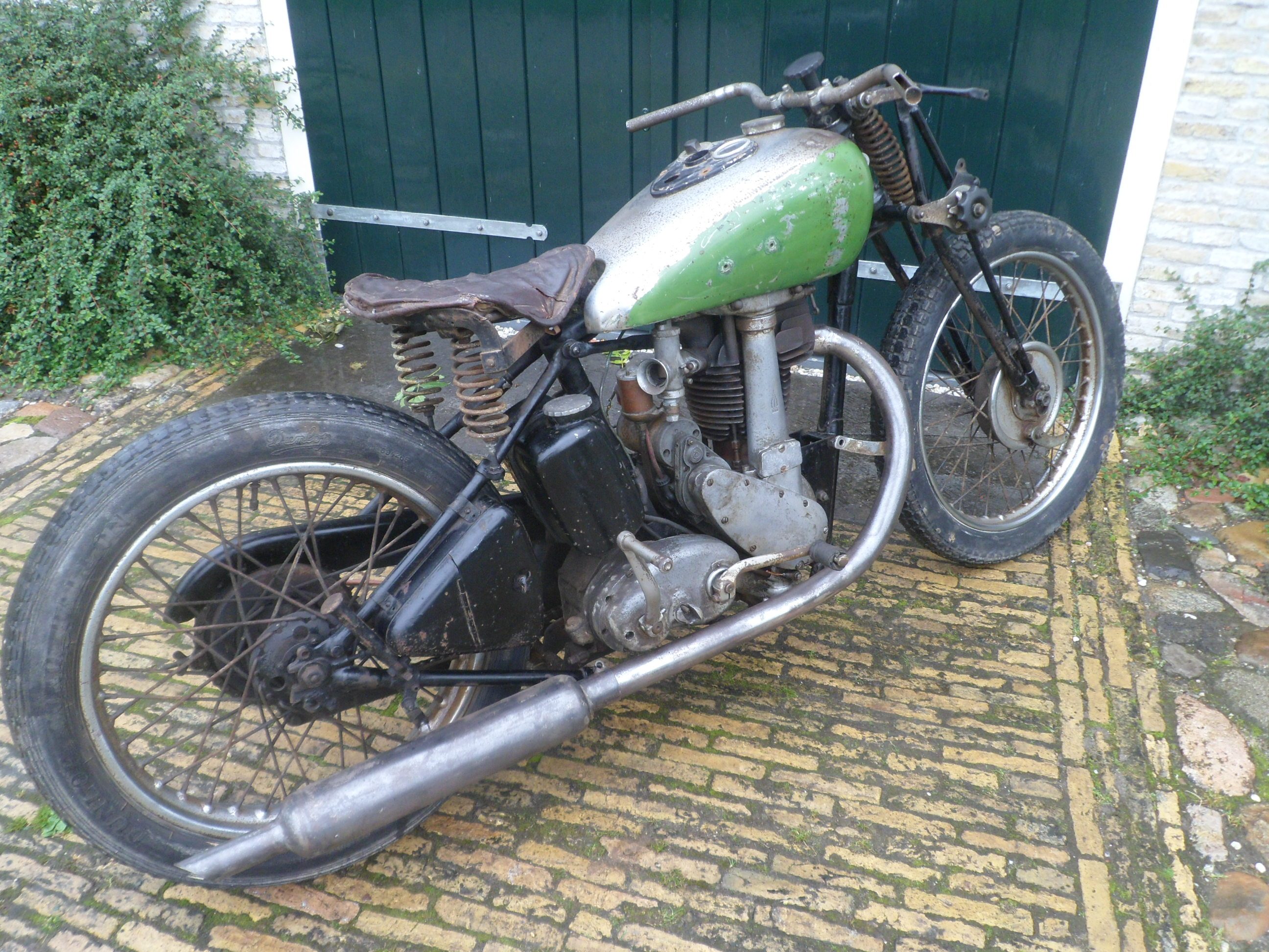 BSA M23 petrol tank during paint removal.