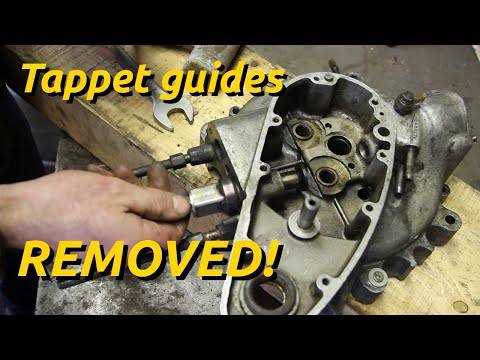 Workshop puller fitted to a BSA crankcase, with text reading “Tappet guides removed”.